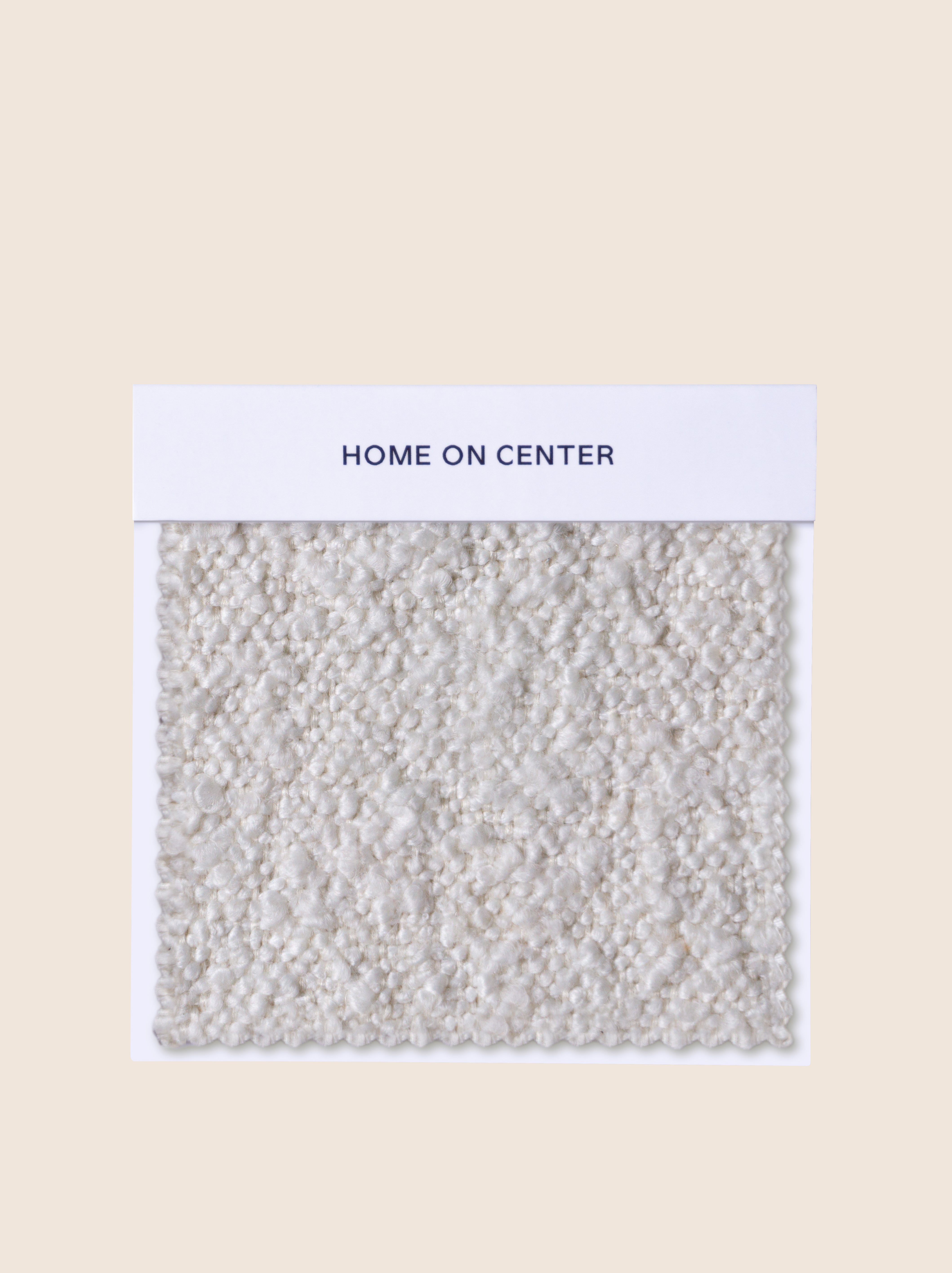 Milky Boucle – creamy off-white with warm undertones and textured boucle fabric for refined upholstery