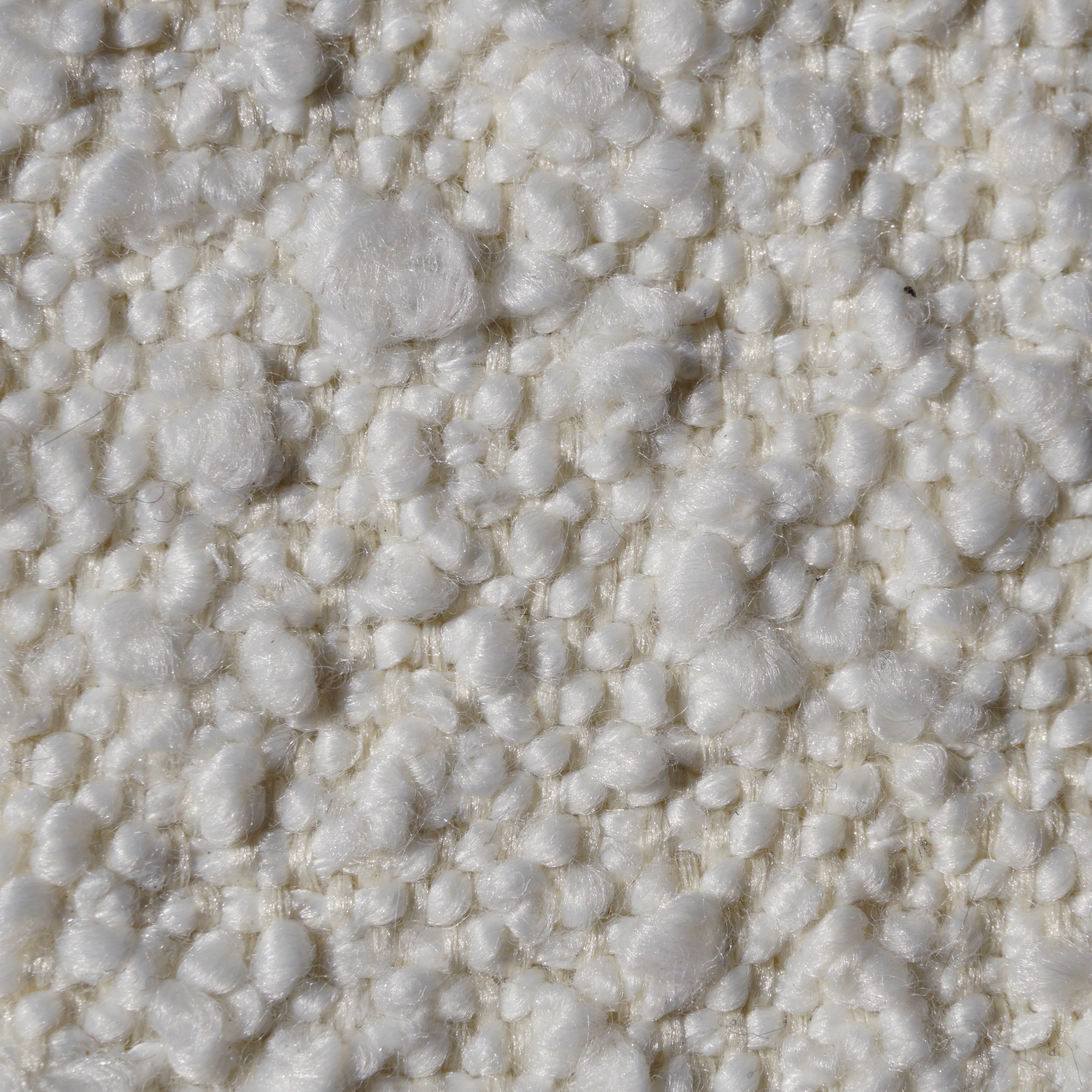 Milky Boucle – creamy off-white with warm undertones and textured boucle fabric for refined upholstery
