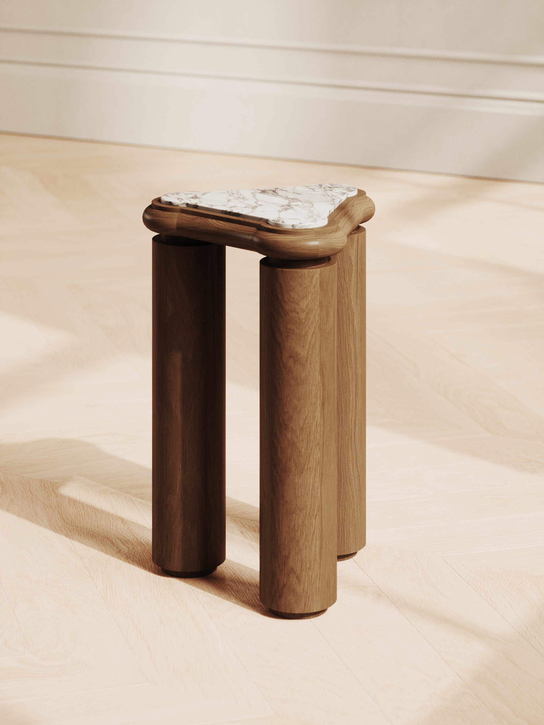 Marble accent table with bold cylindrical legs and stacked design