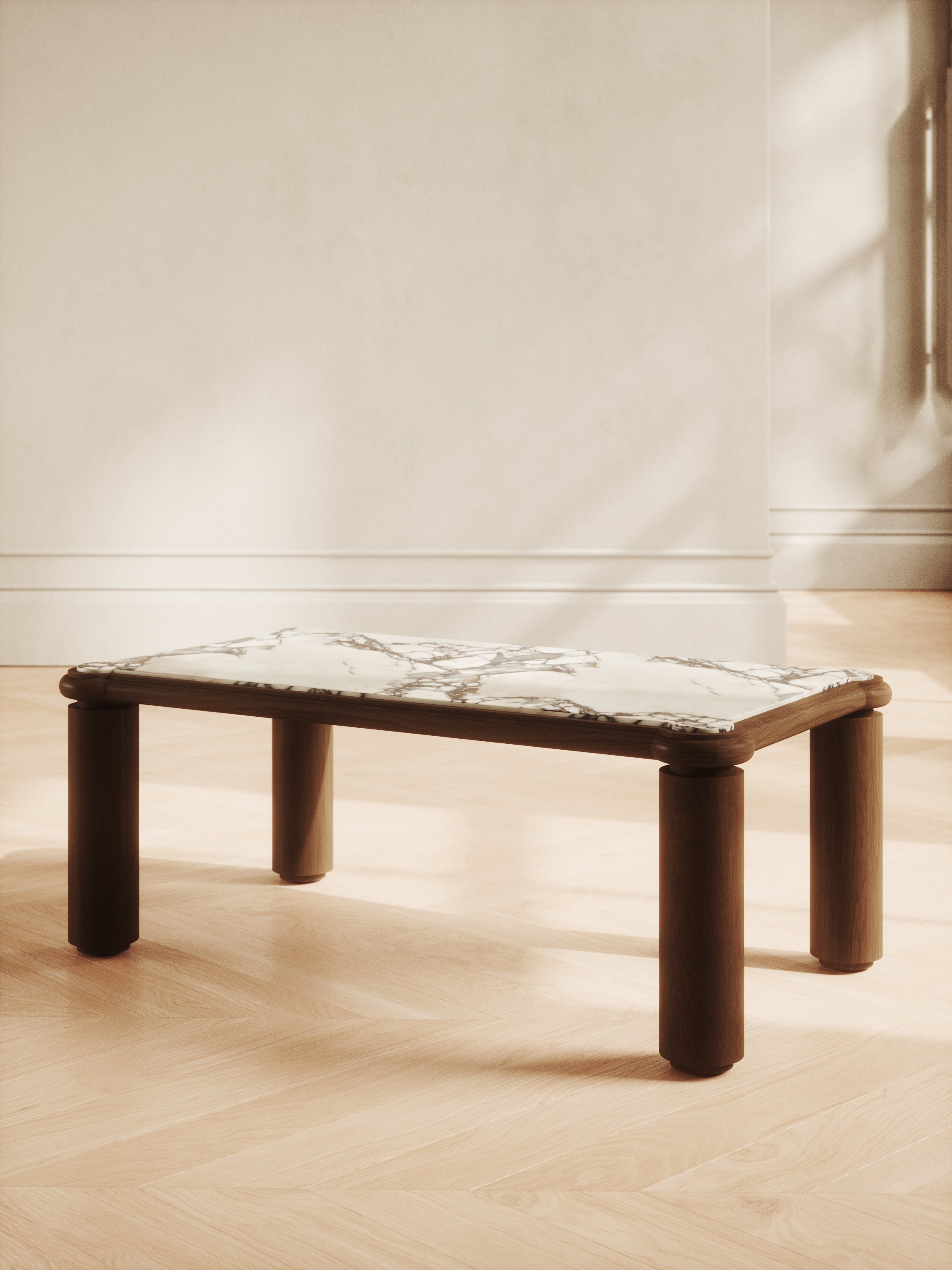 Triangular marble coffee table with bold legs and stackable design