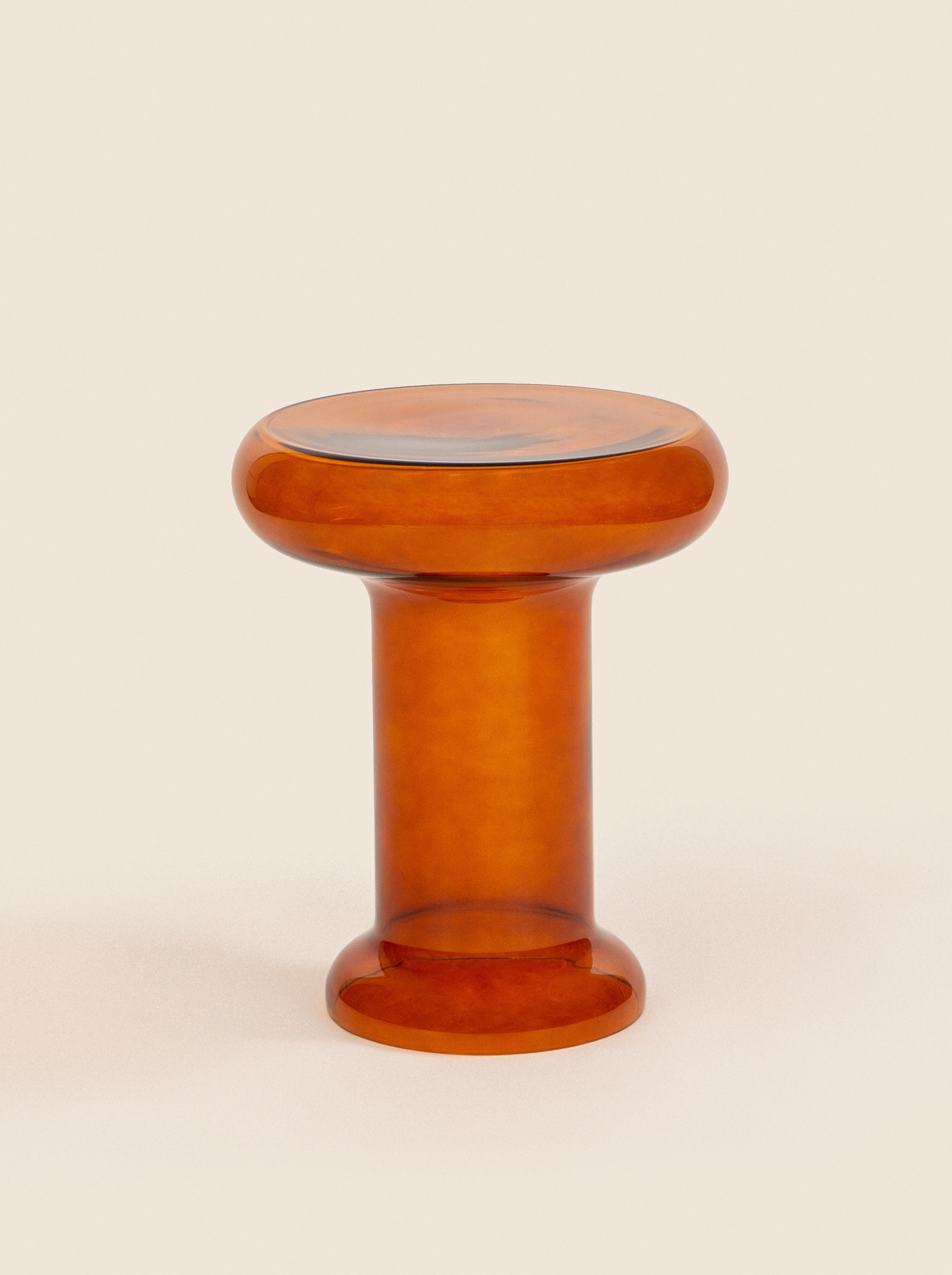 Modern glass accent table with wide top and fluid form – handmade by skilled artisans for a unique statement piece