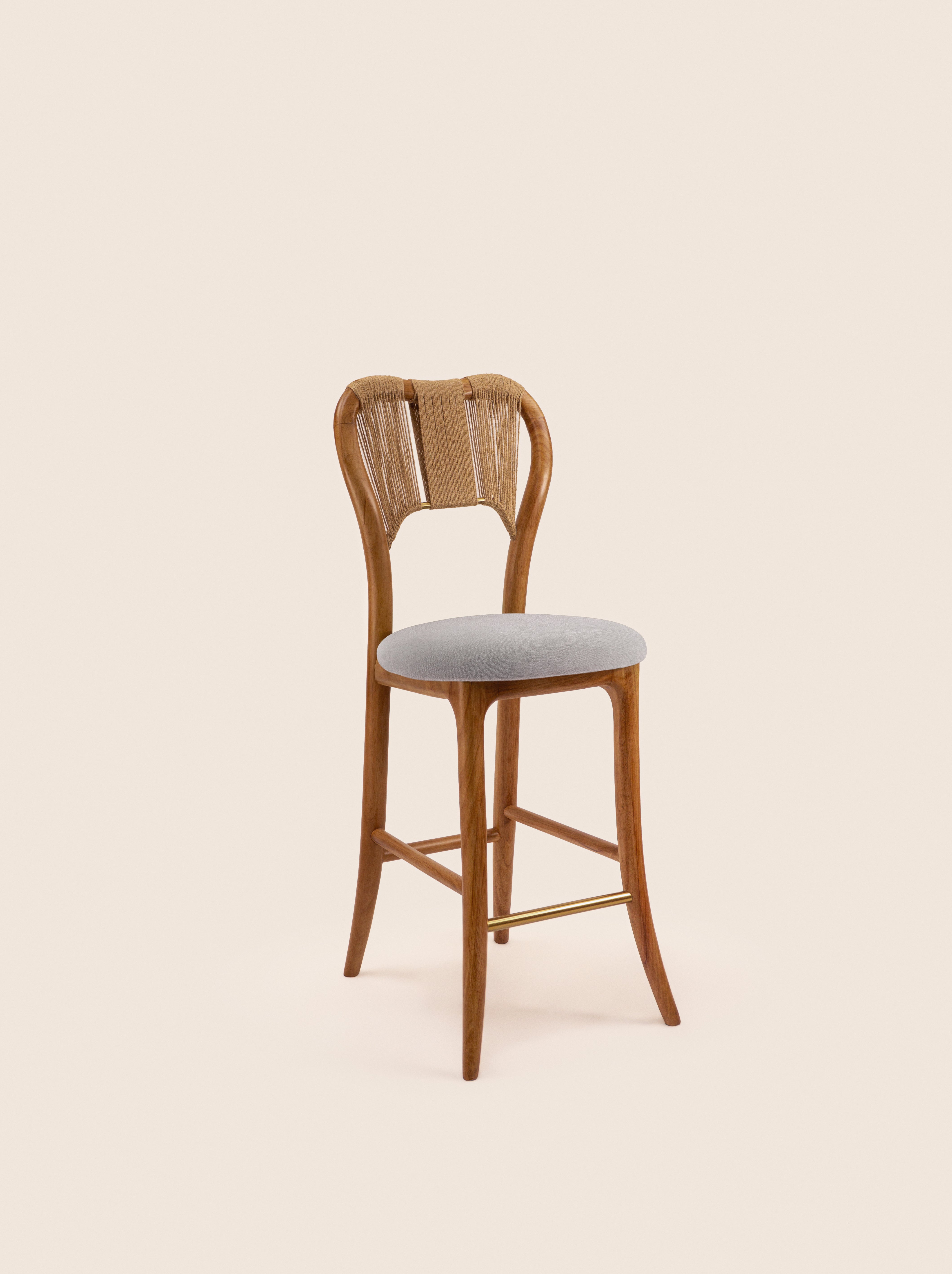 Taraval Counter Stool with handwoven backrest and sculptural wood legs – artisanal design by Home on Center