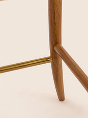 Taraval Counter Stool with handwoven backrest and sculptural wood legs – artisanal design by Home on Center