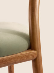 Taraval Counter Stool with handwoven backrest and sculptural wood legs – artisanal design by Home on Center