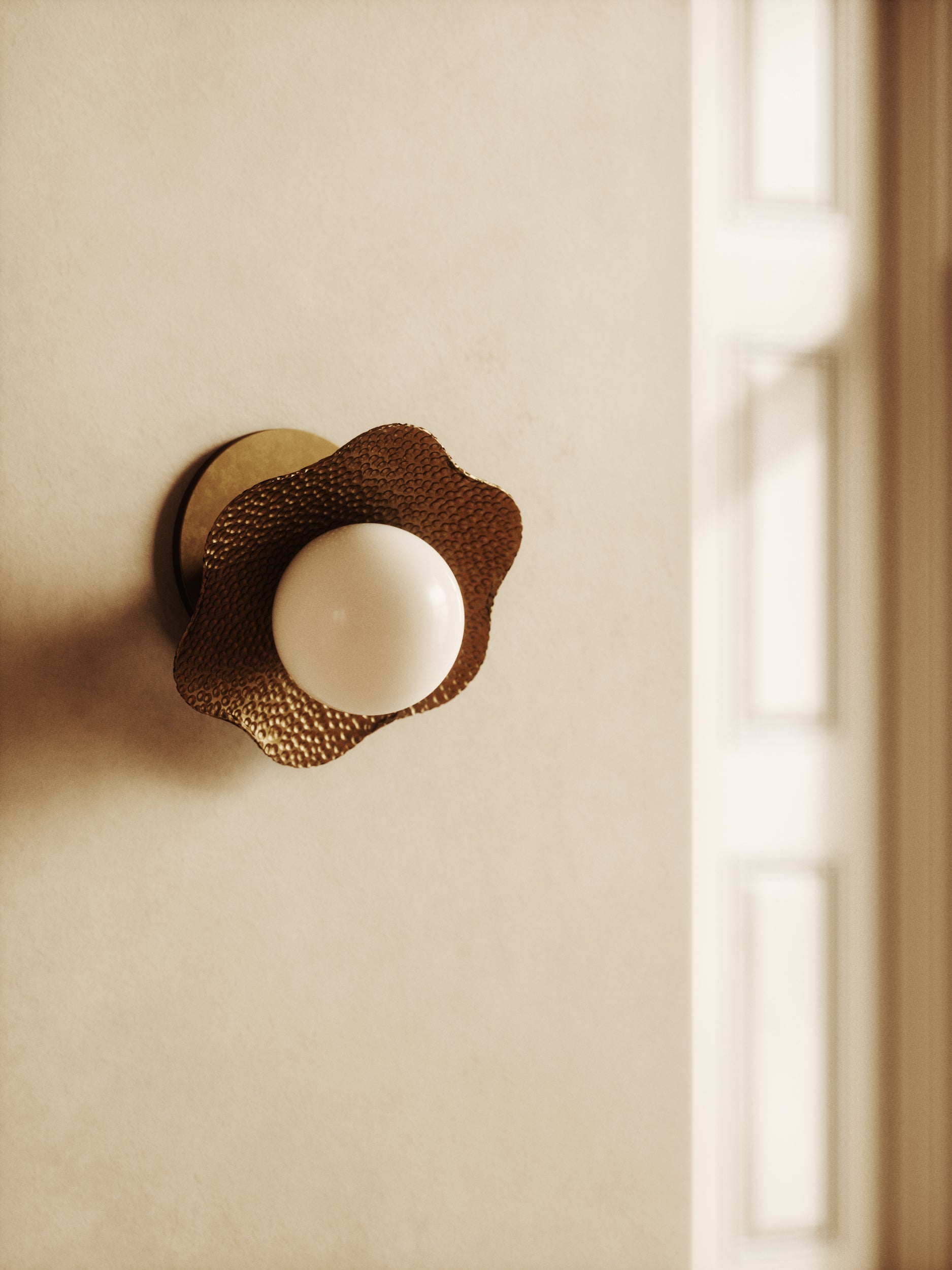 The Hayes Flush Sconce with hammered brass plate and frosted diffuser – handcrafted California design by Home on Center