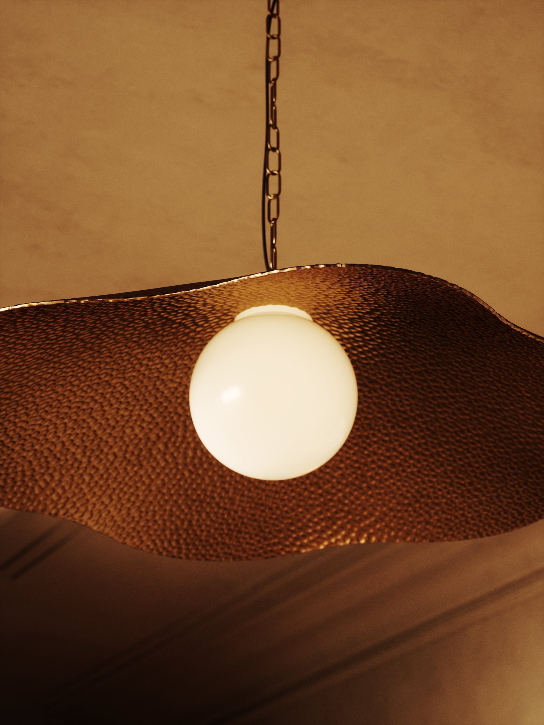The Hayes Pendant Light with hammered metal shade and round diffuser – handcrafted California design by Home on Center