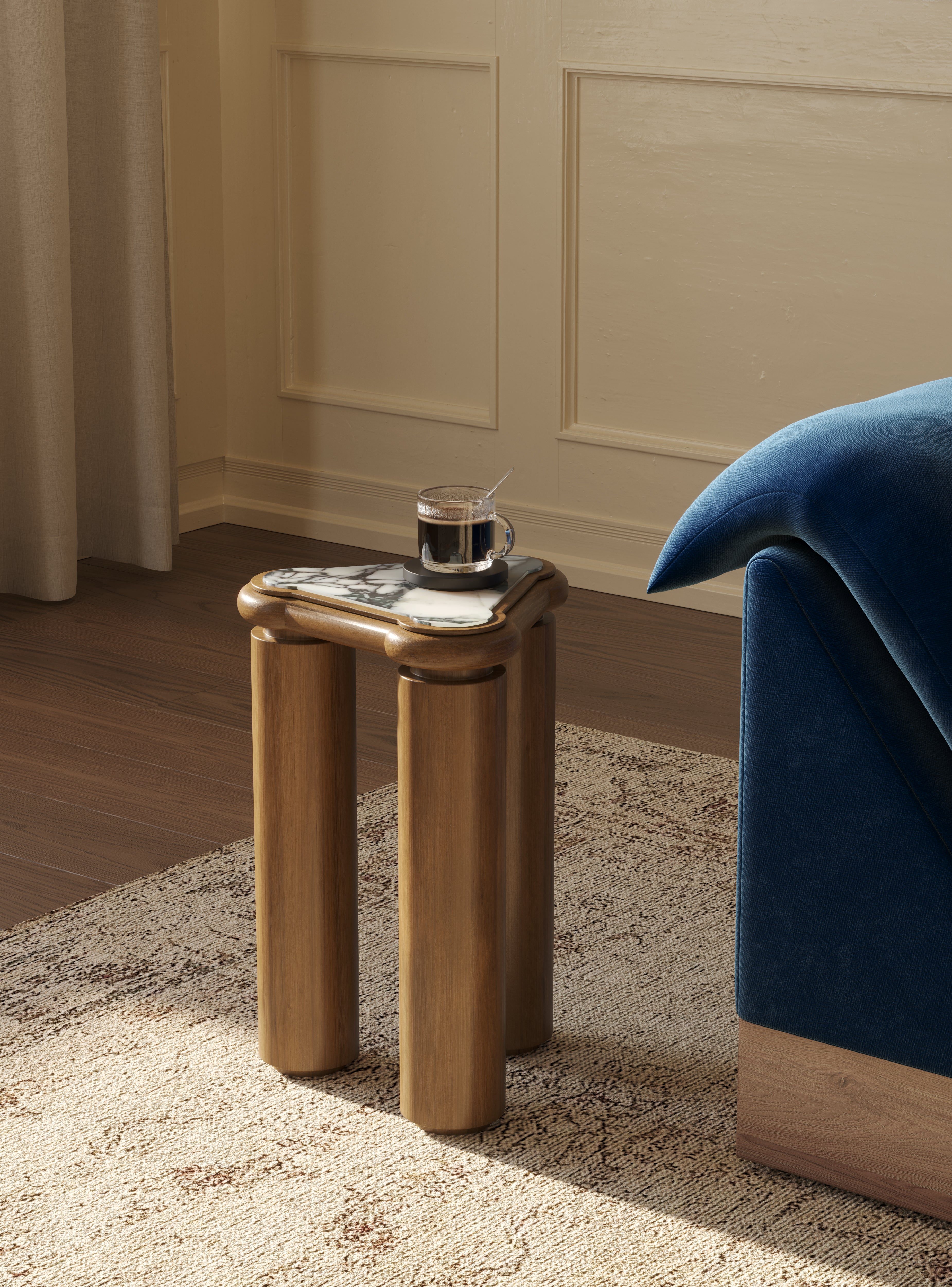Marble accent table with bold cylindrical legs and stacked design