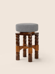 Geary Swivel Stool with turned oak legs and linen seat – artisanal design by Home on Center