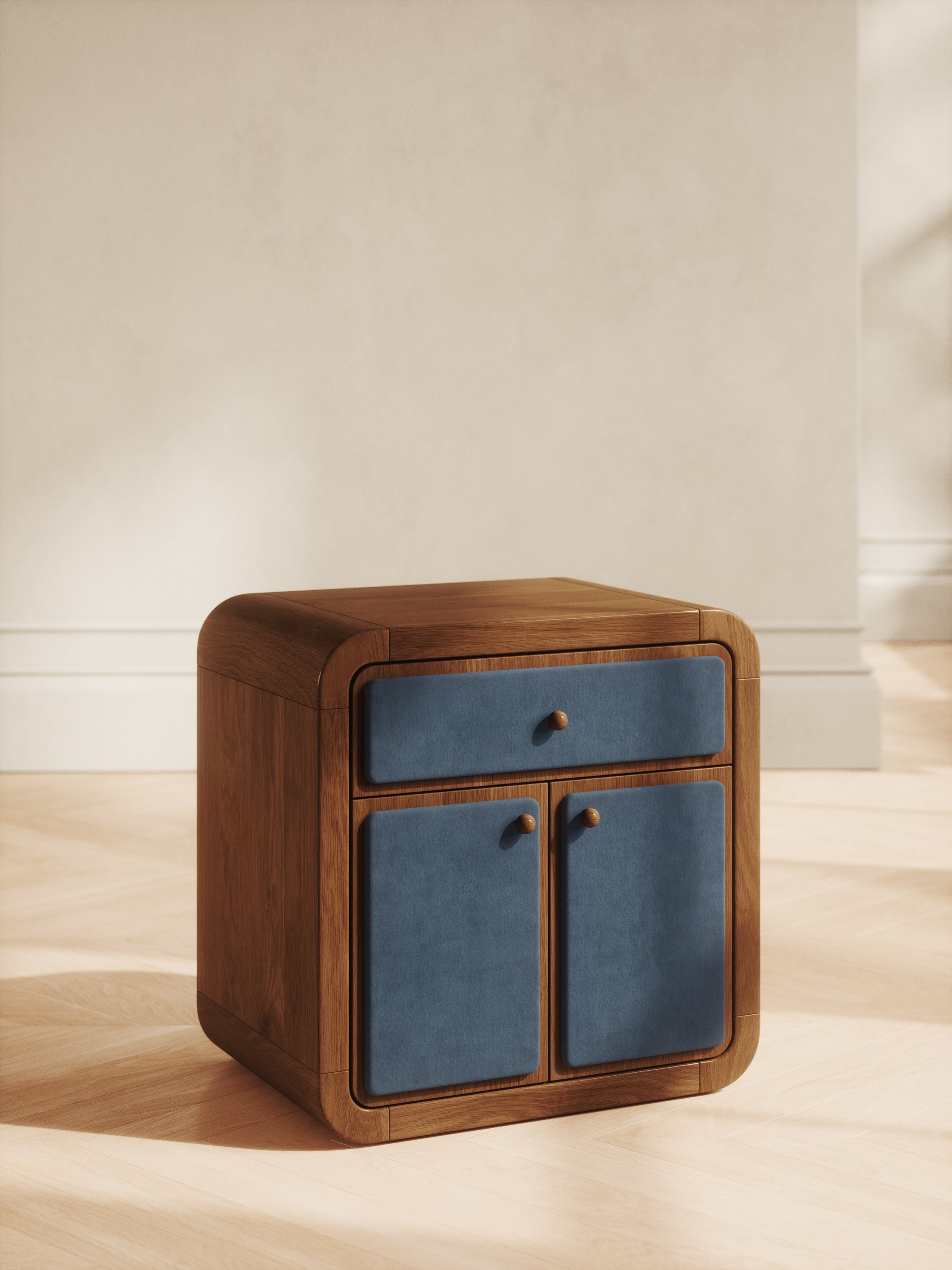 Mid-century wood nightstand with velvet drawers and rounded edges
