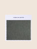 Fern upholstered fabric in earthy green with gray undertones – versatile for sofas and chairs.