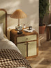Mid-century wood nightstand with velvet drawers and rounded edges