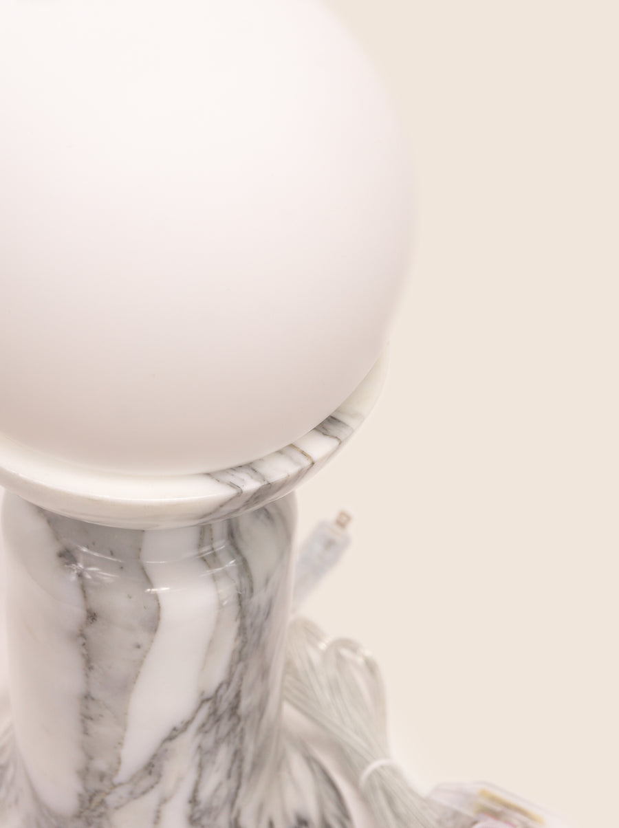 Folsom table lamp with sculptural marble base and glass or globe bulb