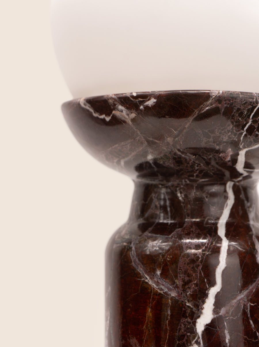 Folsom table lamp with sculptural marble base and glass or globe bulb