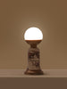 Marble and brass table lamp with globe top and sculptural base