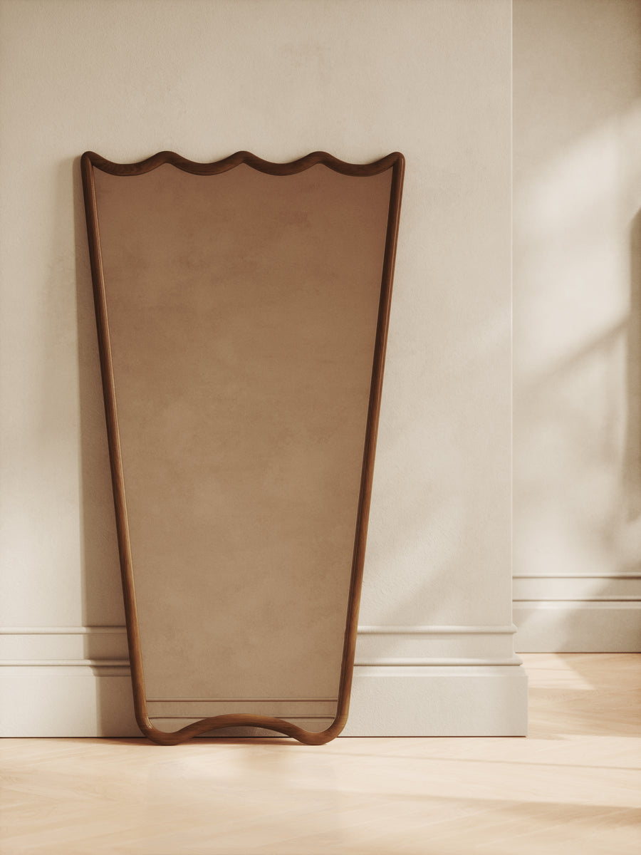Mid-century wood mirror with scalloped top and rounded edges